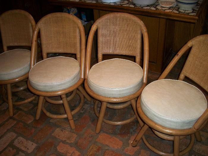Four "Hollywood Regency" style swivel low bar stools plus we have tall ones in this same style