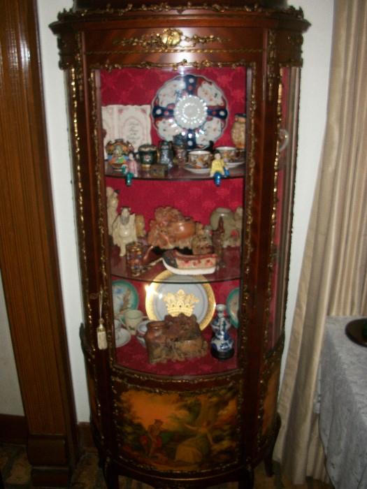 French style lighted curio cabinet
