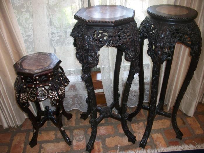 we have 5 inlaid and carved plant stands available