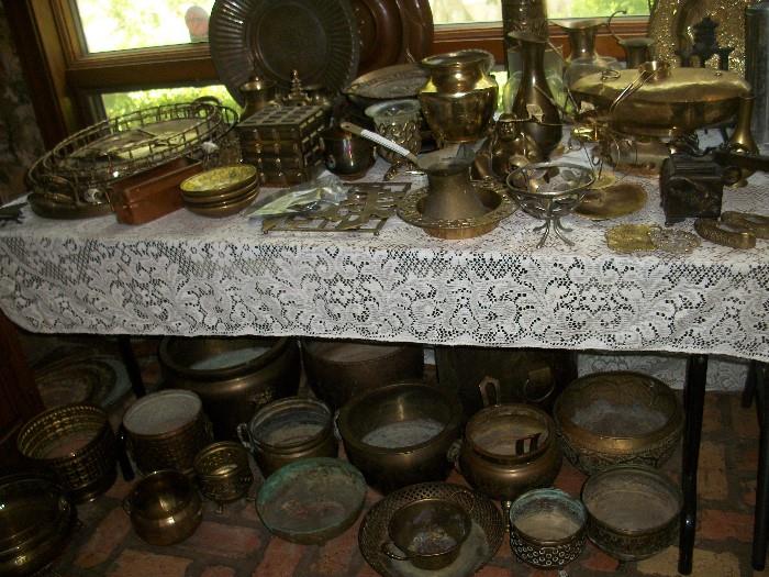 brass--much antique--and we have two more tables filled