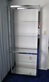 Chrome and glass shelving unit (one of a pair)