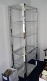 Chrome and glass shelving unit (one of a pair)