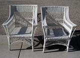 Antique white painted wicker armchairs
