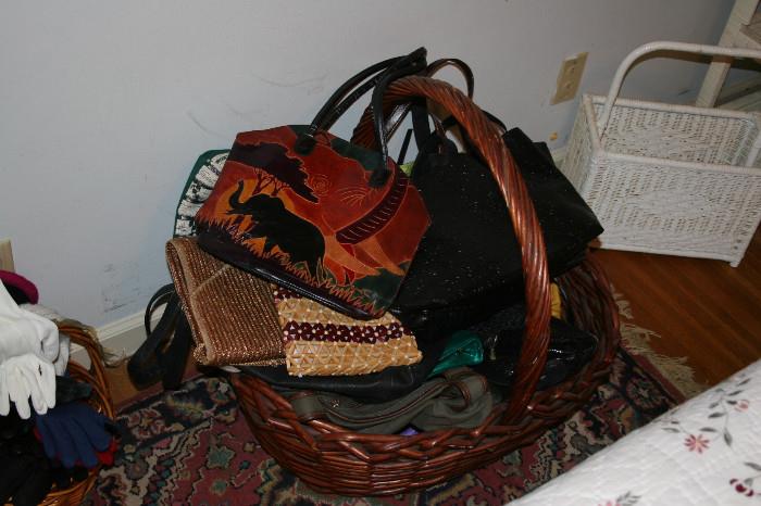 Big basket of handbags: leather, straw, fabric