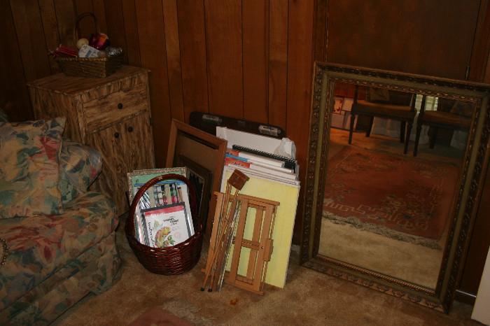 Small storage cabinet, art supplies, large framed mirror