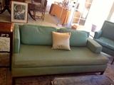 There is a pair of these mid century hard wood sofas, They have a great look and can be set axone long sofa. Priced to sell as they need to be redone.