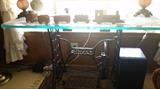 We have two singer sewing machine tables