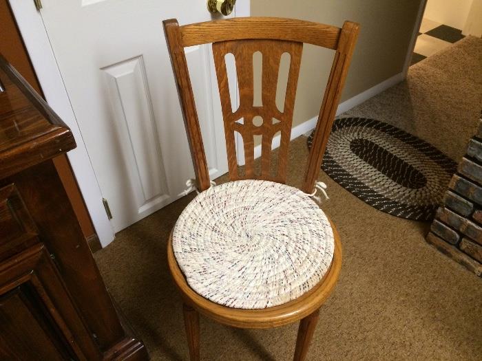 Five antique cane and oak chairs with seat pads