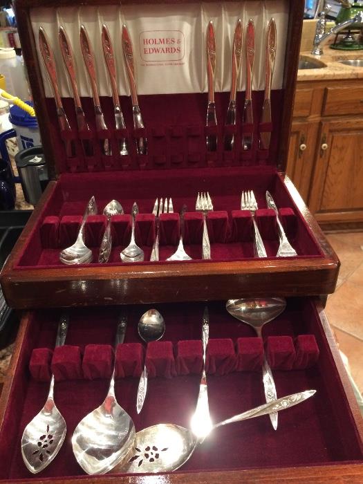 8 5-piece placing sittings of Morning Rose silver plate sterling flatware plus extra pieces and serving pieces.
