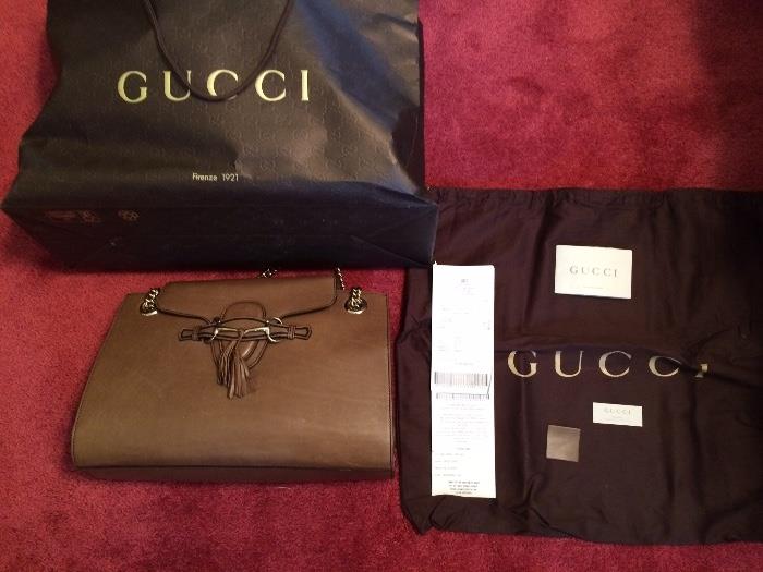 Authentic Gucci handbag purchased in Milan, Italy.  Have papers to prove authenticity.