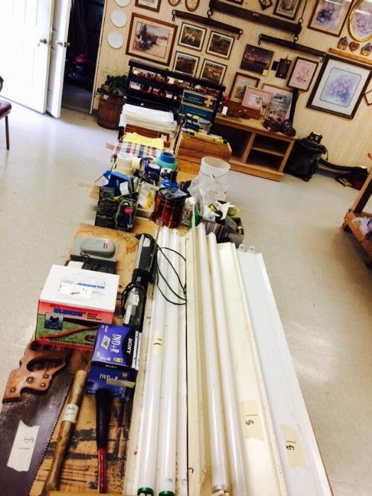 Tools, fluorescent ceiling lights, and lots of other misc. items