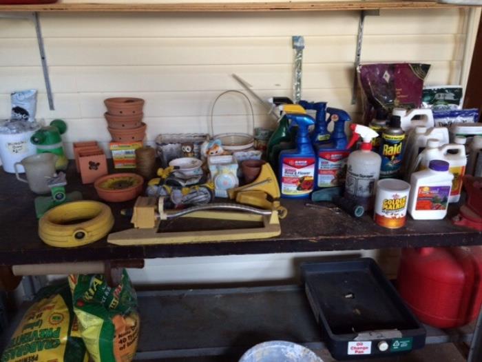 Garden watering devices, garden sprays, gas can, oil pan, lawn fertilizer.