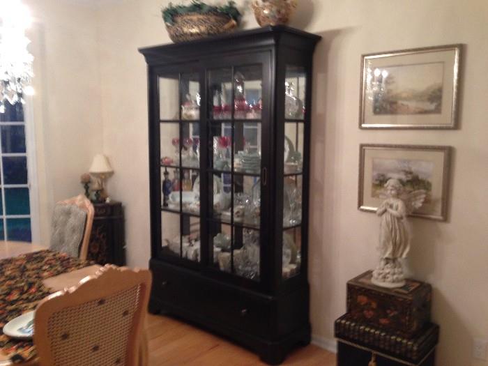 Black Hooker Display unit - purchased in the last few years - was originally $2000 - for this sale only $750 - in perfect condition.   Dining set not clearly shown well here but has four chairs and table - $500