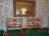 Dining Room:  Large ornate frame/beveled mirror; lots of pink depression glass.