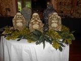 Dining Room:  Three Buddhas: hear no evil, speak no evil, see no evil.  In the background is a black princess head.