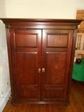Music Room:  A large armoire measures 51" wide x 22" deep x 68" tall.