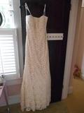 Bedroom #3:  NEW NEVER WORN Size 12 ivory wedding dress by Jovan (retail tag says $575).