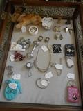 Living Room:  The smalls include:  sterling jewelry, a sterling Tiffany "return to Tiffany" charm bracelet; a pair of sterling TIFFANY posts; a small vintage STIEFF bunny, a few rosaries; a leaf HEREND dish, and a pink Coach key holder.