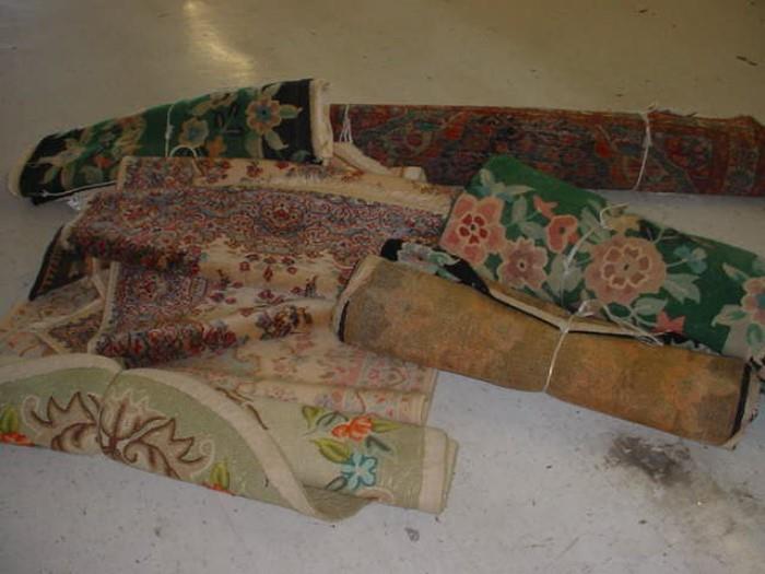 There are a quantity of vintage rugs, Oriental, hand knotted hooked rugs, Iran and Turkey rugs, as well as newer carpet.