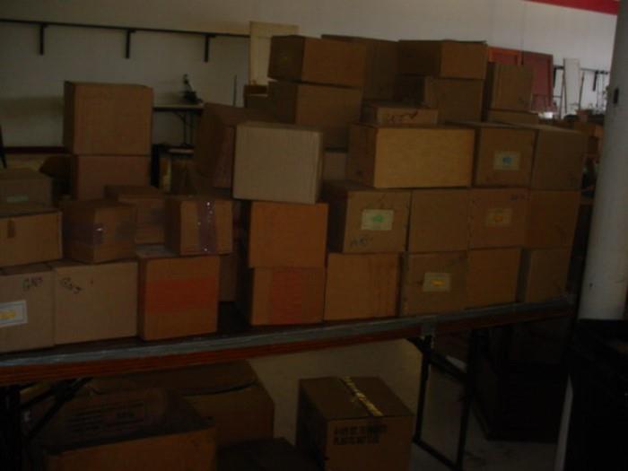 MORE of the 100's of boxes..all containing glassware, pottery, tools, toys, and just about anything else you can imagine