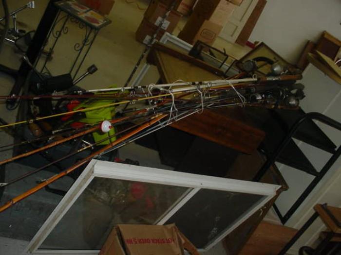 Bundle of old fishing rods and reels, and many many lures