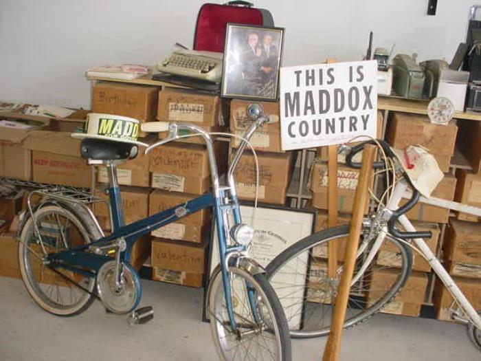 These two bicycles were part of Lester Maddox campaign bikes, as the Aunt of this man worked for him as he ran for Governor of Georgia. There is much memorabilia, photos, certificates, signed axe handles, alarm clock and more.