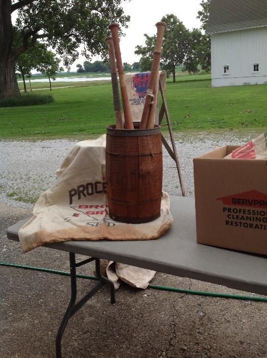 Old wooden nail keg, wooden ball bats