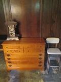 dresser, clock and stool