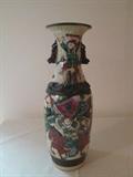 Very ornate and colorful vase