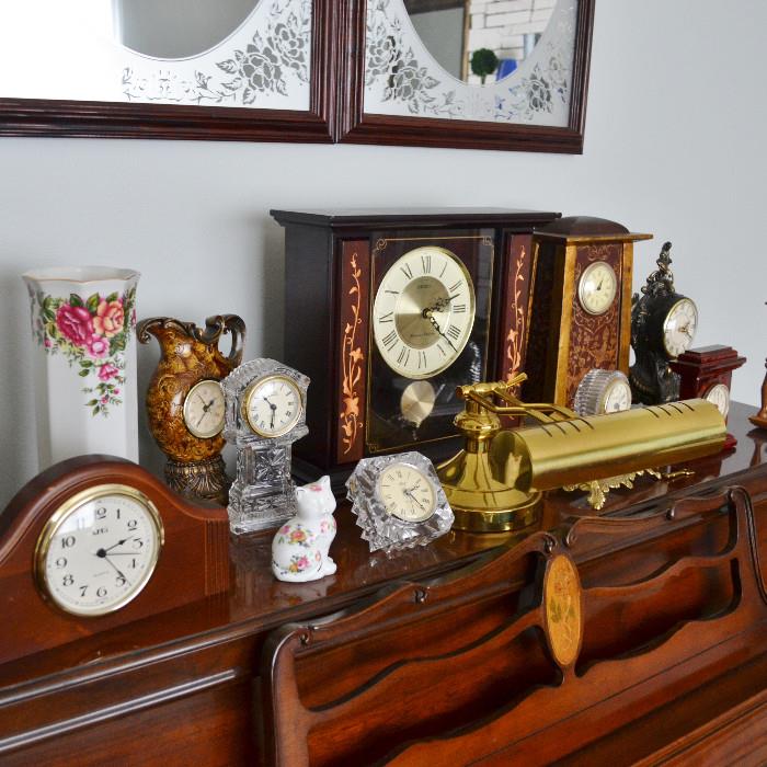 A regal collection of clocks from all over the world, of all sizes and shapes, mostly modern with a few vintage, all collectible and in working condition