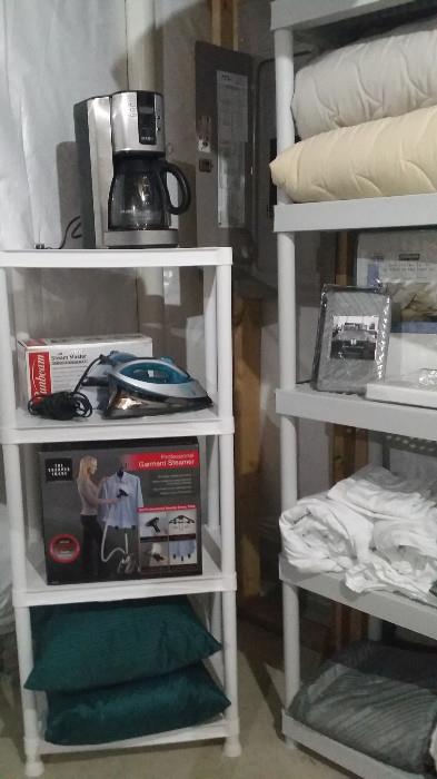 Garment Steamers, Irons and Ironing Board, Like New Pillows, Linens, Sheets, Comforters, lots of practical items in great condition, Coffee Pots, Microwaves, Unopened Nutribullet