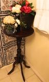 Small Wooden Table, Floral Arrangements, Shower Curtain, Towels