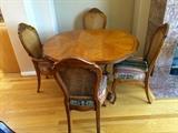 Small dining table on cabrole legs with matching chairs 