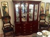 Chippendale style mahogany China cabinet with leaded glass doors 
