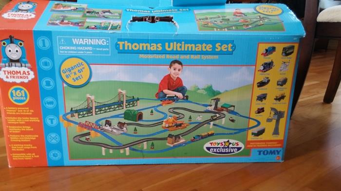 New in box, Thomas the Train motorized road and rail system. 81"x61" .Retail 400.00