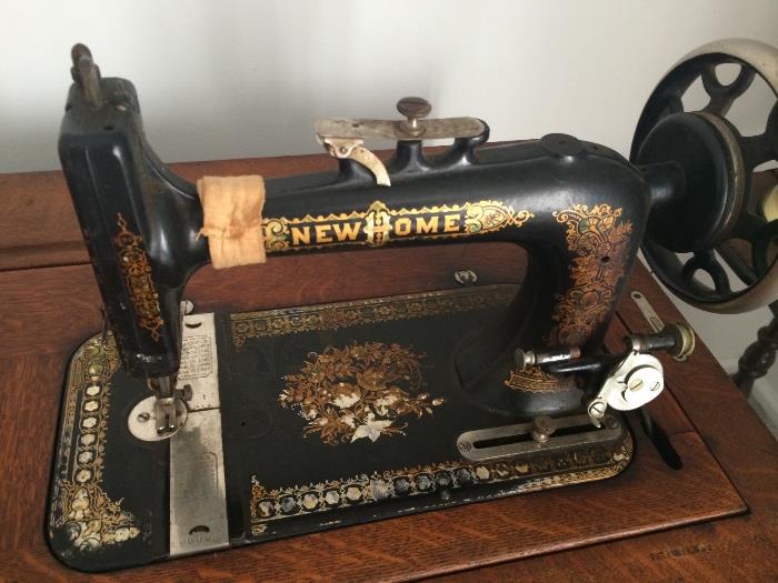 New Home vintage sewing machine and cabinet