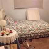 Pop up trundle with 2 great mattresses, white wicker headboard, bisque flower collection, cycle exerciser, wedge pillow