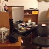 Corner office desk, chair, DVD player, lamps, printer, stationery, cameras