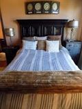 queen bed with rustic chests