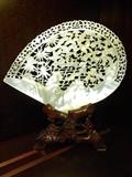 LARGE CARVED SHELL ON STAND