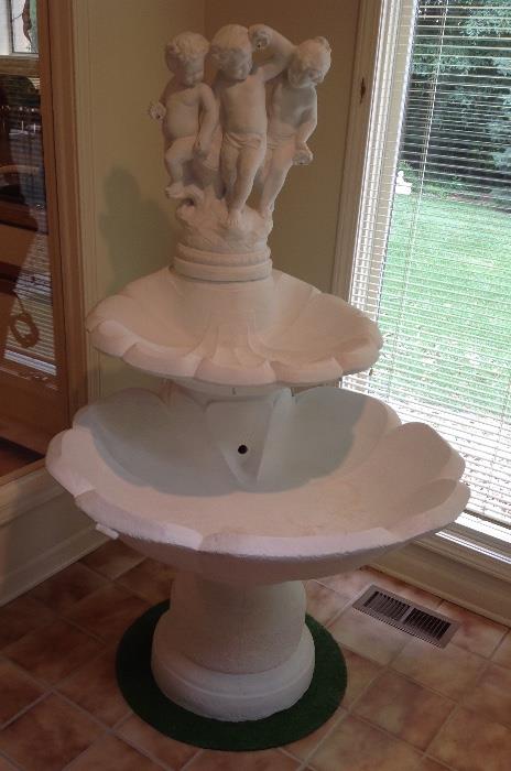 Stunning Cement Water Fountain for Outdoor Use - has been stored indoors.  Measures 5 feet tall and 3 feet in diameter at its' widest.
