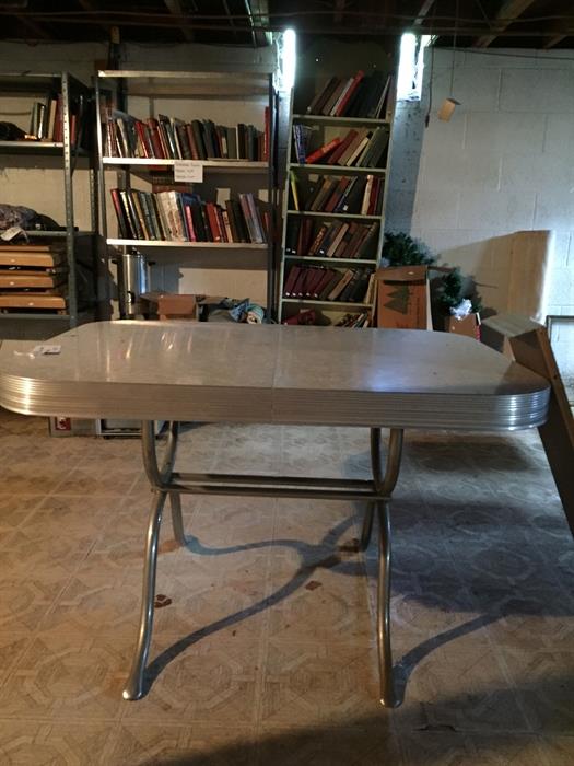 Awesome vintage retro table with leaf!   Chrome with gray patterned top.