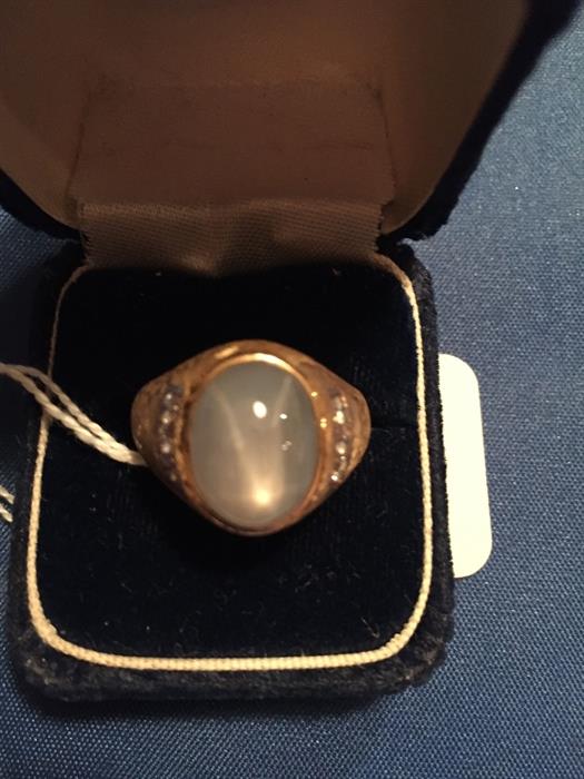 Men's 14k yellow gold 14+ ct. Star Sapphire and Diamond ring.  Diamonds are bead set along each side.  Appraisal available for you to see.