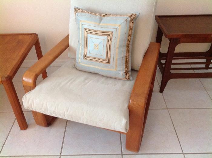 Vintage collectible teak wood chairs with original fabric underneath.