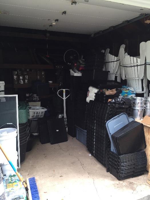 the garage is packed!  this is a photo BEFORE the storage unit was delivered….