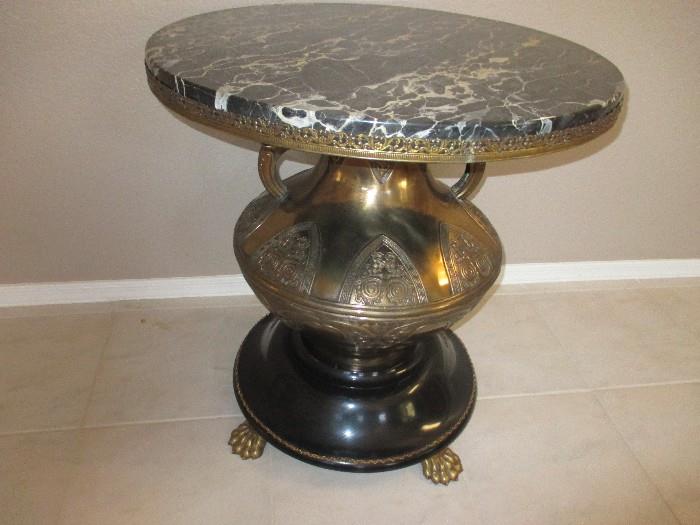 Marble, brass, claw feet....the perfect conversation piece - just don't pick it up from the top!
