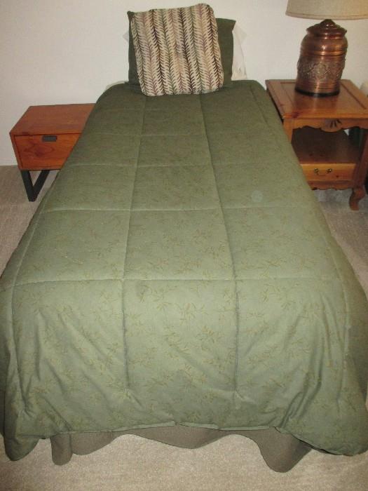 One of two matching twin electric beds