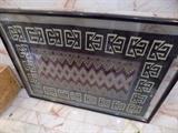 framed vintage Navajo tapestry