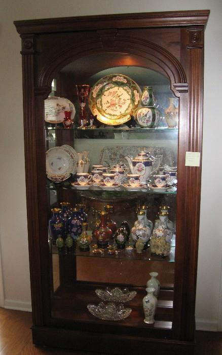Curio and contents are all for sale.