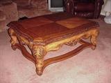 Coffee table in living room, top with parquetry inlay